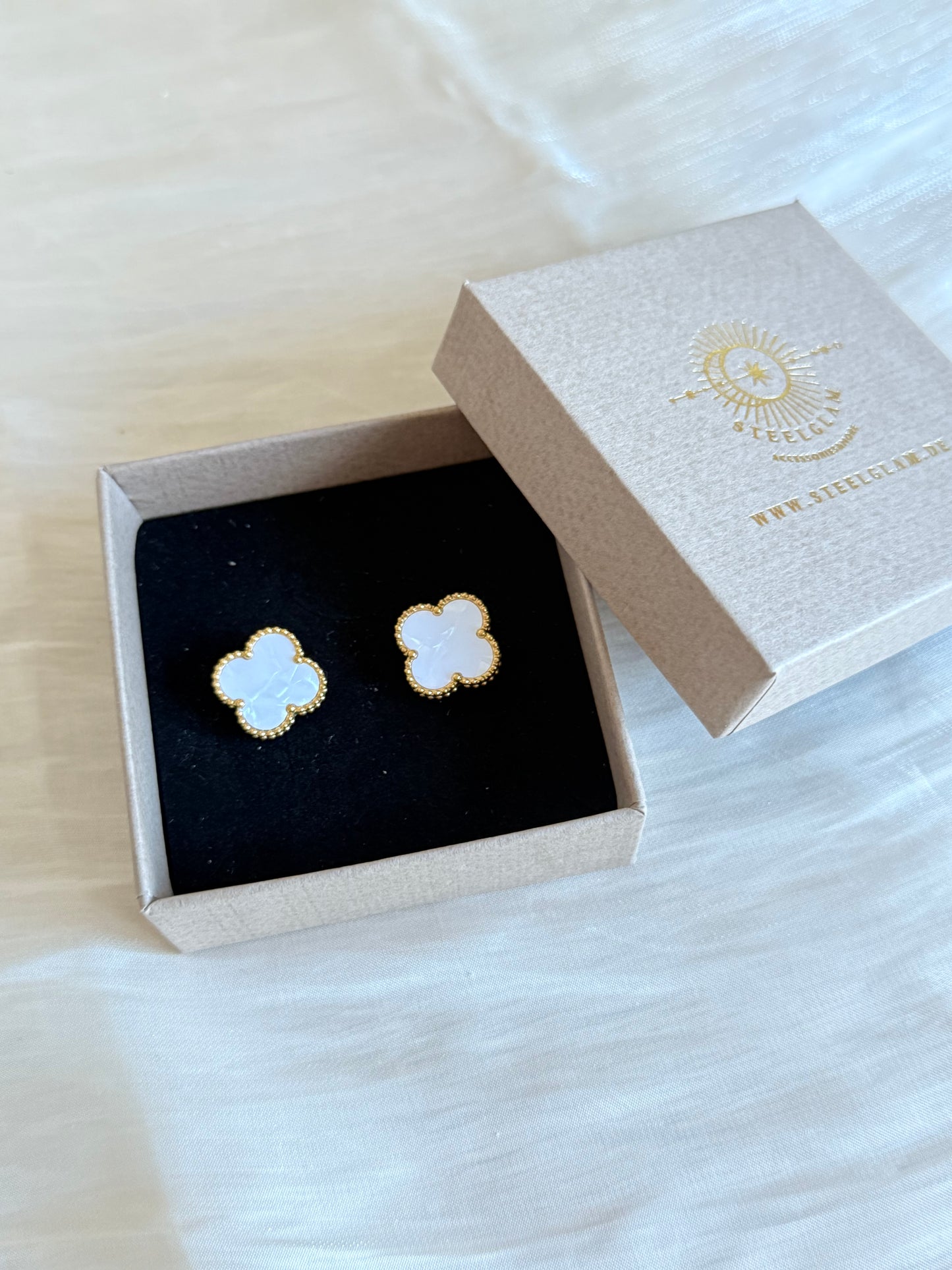 Eline in white “Earrings “